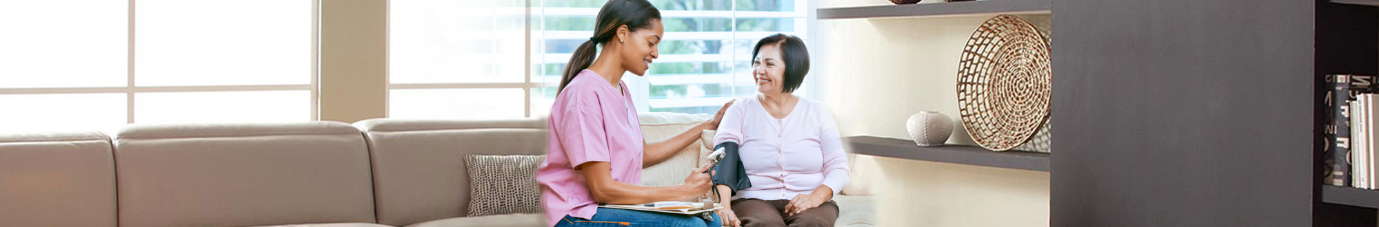 nurse checking blood pressure of the woman